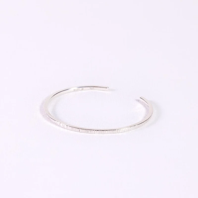 Armspange Cola Structural Silber gestrichen