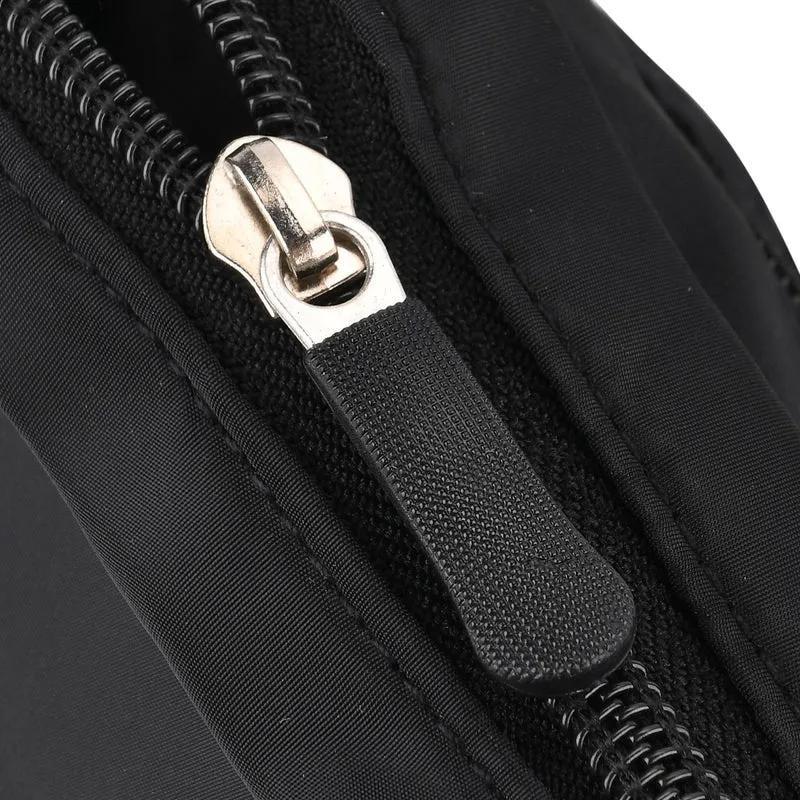 Umhängetasche mit mehreren Reißverschlussfächern und RFID-Schutz, Größe 12,5x6x16 cm, Rosenrot