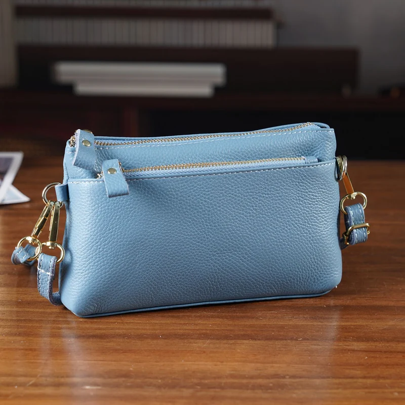 Leder Crossbody Tasche mit mehreren Reißverschlussfächern und verstellbarem Schulterriemen 21.5 x 4 x 13 cm Gelb