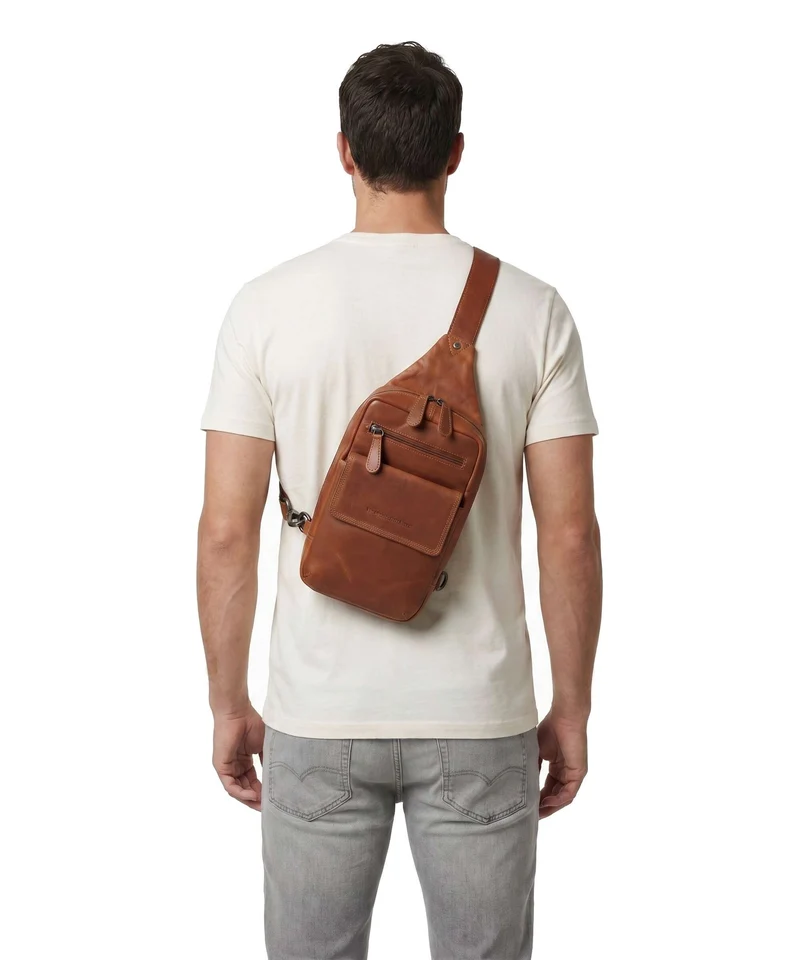 The Chesterfield Brand Wax Pull Up Cow Turelle Slingbag cognac
