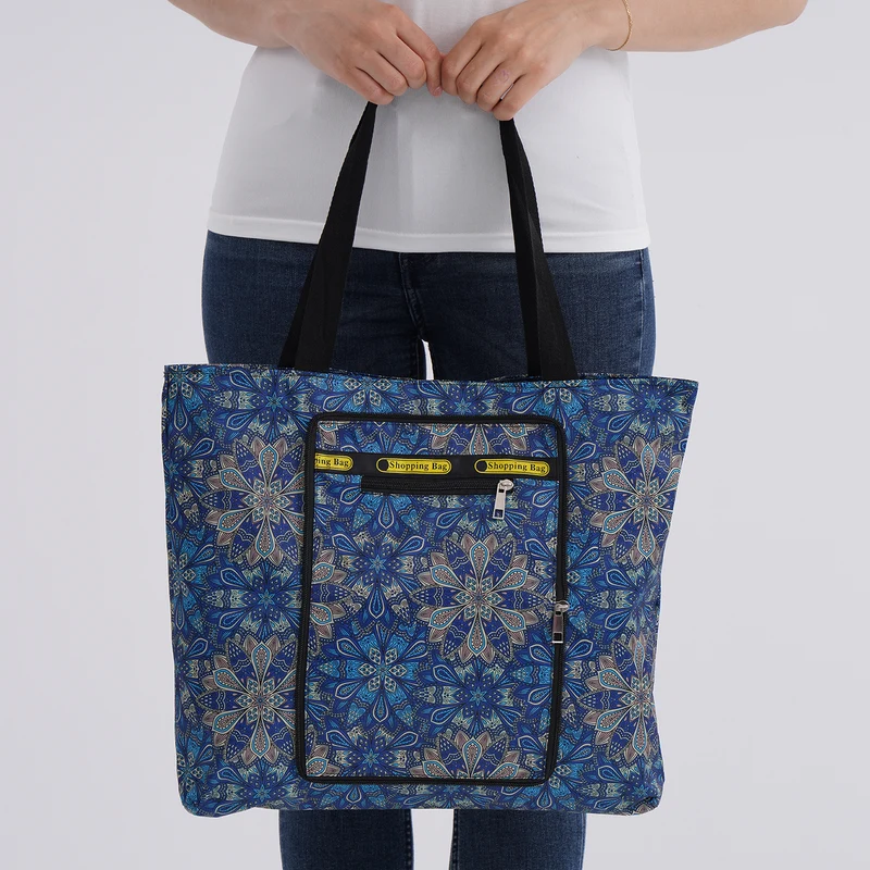 Faltbare Einkaufstasche mit Blumenmuster, aus wasserabweisendem Polyester, mit Innen- und Außentasche, 40x43 cm, Tragegriffe ca. 22 cm, Blau