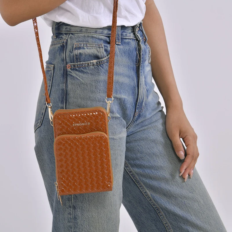 PASSAGE geprägte Kunstleder-Umhängetasche mit RFID-Schutz und langer Trageriemen, 13x7.5x19 cm, Orange