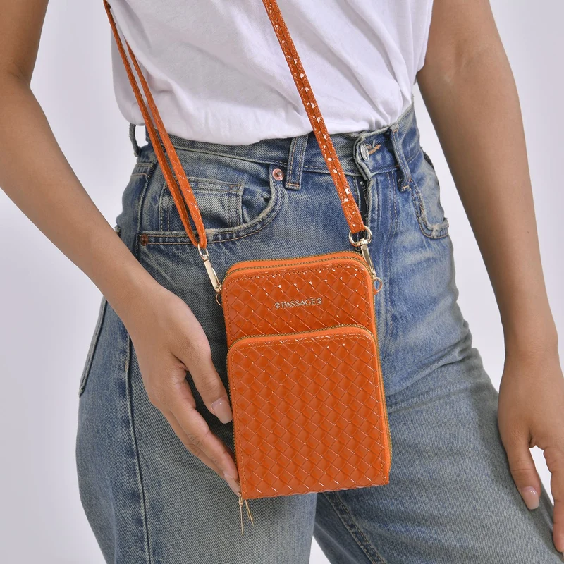 PASSAGE geprägte Kunstleder-Umhängetasche mit RFID-Schutz und langer Trageriemen, 13x7.5x19 cm, Orange