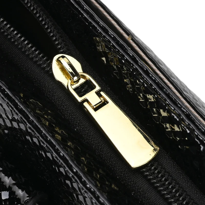 Stylische Sling-Umhängetasche mit klassischem schwarzem Zebramuster, vielseitigem Gurt und praktischen Fächern, 26x10x15 cm